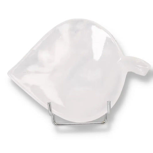 Rose Onyx Platter with smooth polished surface and unique veining, displayed on a metal stand for elegant table presentation.
