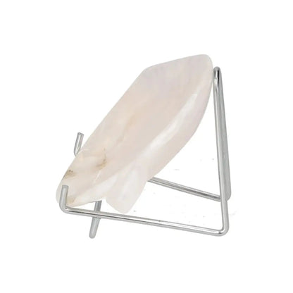 Rose Onyx Platter with polished surface on metal stand, showcasing unique color variations and veining, reflecting light elegantly.