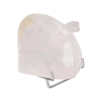 Rose onyx platter on display stand, showcasing unique variations in color and veining, perfect for elegant home decor.
