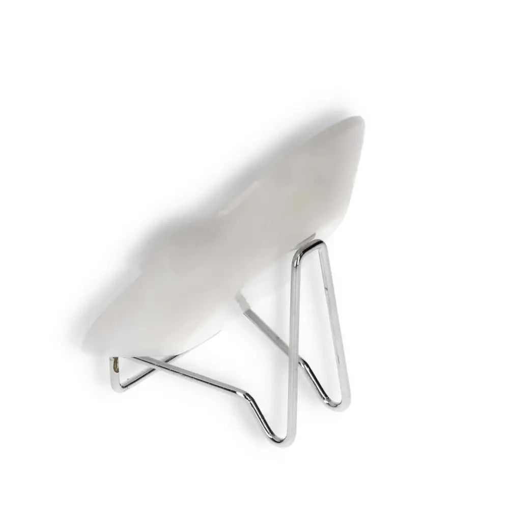 Rose Onyx Platter with a polished surface on a chrome stand, displaying unique veining and warm tones for elegant table settings.