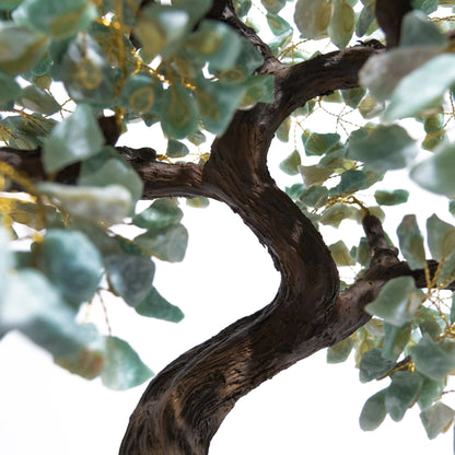 Close-up of Rough Aventurine Tree with handcrafted leaves, symbolizing prosperity and positive energy, on a curved trunk.