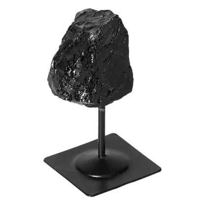 Rough Black Tourmaline on Metal Stand S, handcrafted crystal for energy cleansing, from Sylvia Crystals.