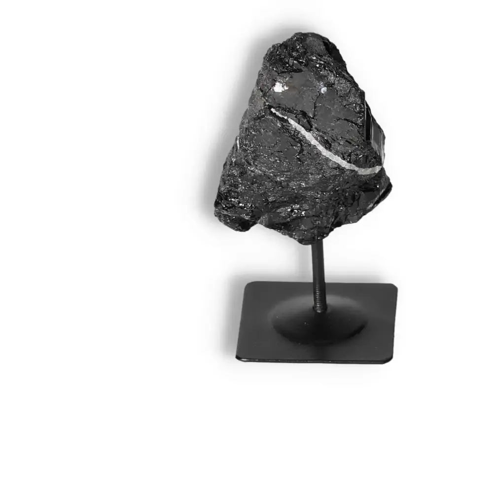 Rough Black Tourmaline on Metal Stand, premium quality crystal from Sylvia Crystals; ideal for cleansing and protecting against negative energies.