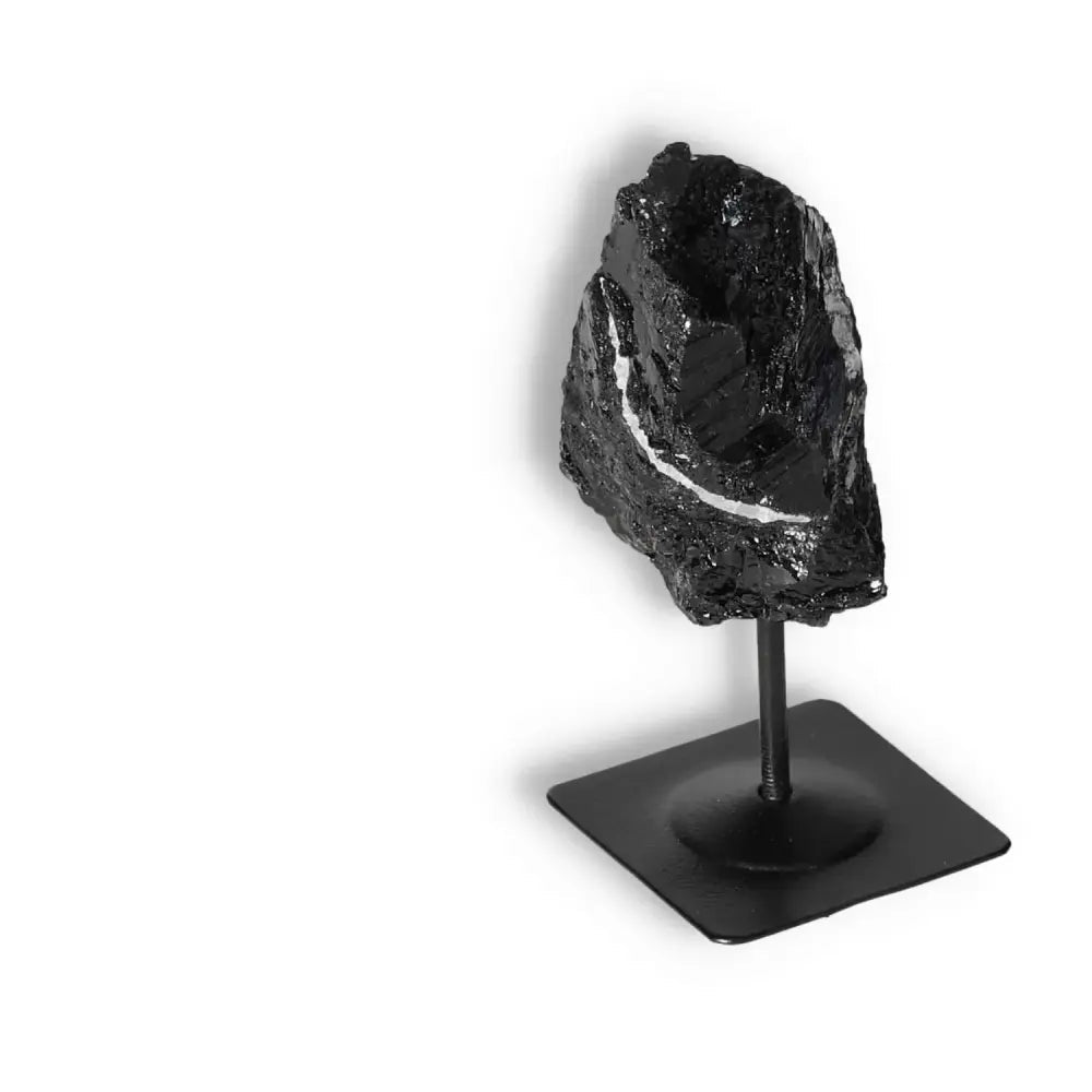 Rough Black Tourmaline with Metal Stand S, a premium crystal for cleansing negativity, offered by Sylvia Crystals. Authentic and handpicked.