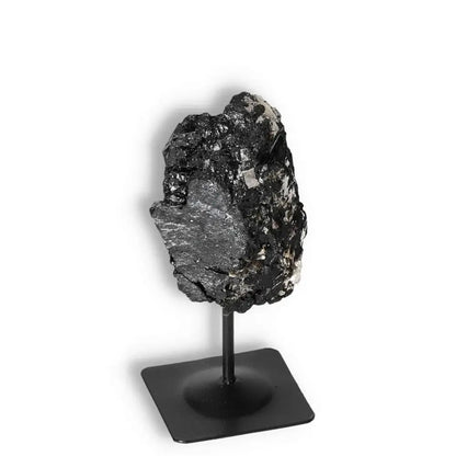 Rough Black Tourmaline with Metal Stand S - Premium crystal for transforming negative energies by Sylvia Crystals.