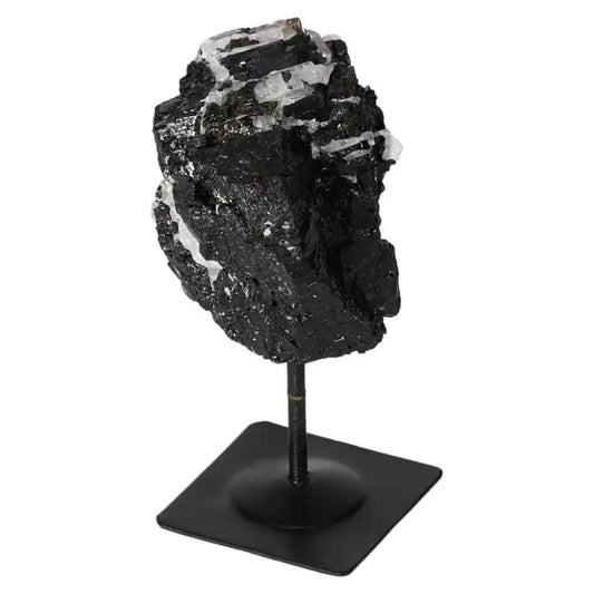 Rough Black Tourmaline with Metal Stand S by Sylvia Crystals, known for cleansing and neutralizing negative energies.
