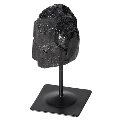 Rough Black Tourmaline on Metal Stand S from Sylvia Crystals, known for cleansing energies and promoting balance. Premium crystal decor.
