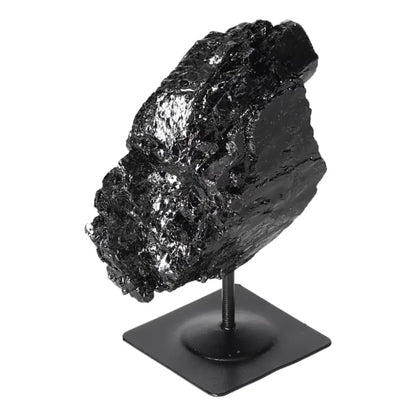 Rough Black Tourmaline on Metal Stand by Sylvia Crystals, known for powerful energy cleansing and luxurious crystal decor.