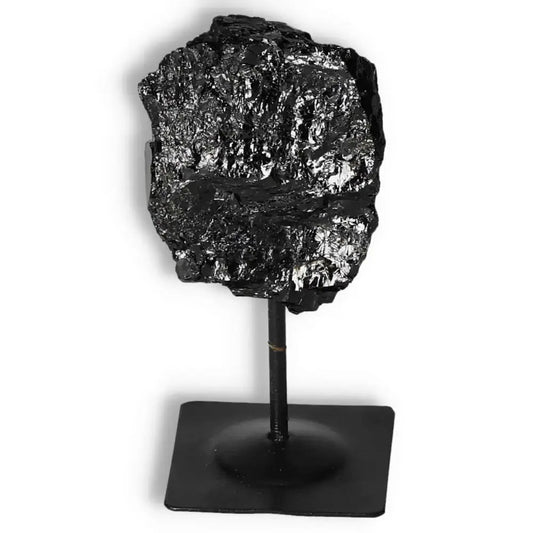Rough Black Tourmaline on Metal Stand S by Sylvia Crystals, enhances space aesthetics and boosts spiritual well-being.
