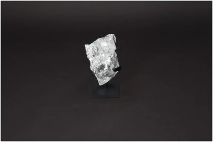 Rough Lemurian Quartz on metal stand, premium Sylvia Crystals product known for purification and harmonizing energy.