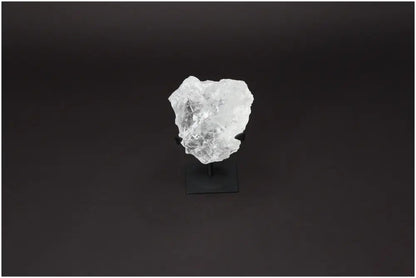 Rough Lemurian Quartz on metal stand, featuring clear crystal design, from Sylvia Crystals for purification and harmonious living.