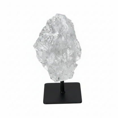 Rough Lemurian Quartz on metal stand, a premium Sylvia Crystals' product, harmonizes and balances energy, perfect for body and mind purification.