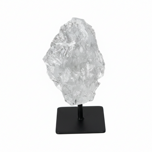 Rough Lemurian Quartz on metal stand, a premium Sylvia Crystals' product, harmonizes and balances energy, perfect for body and mind purification.