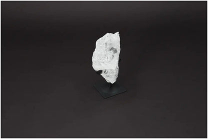 Rough Lemurian Quartz on elegant metal stand, premium clear crystal for energy balance and purification, by Sylvia Crystals.