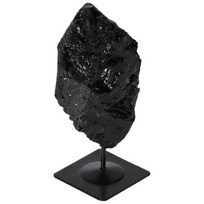 Rough Tourmaline Crystal on Metal Stand by Sylvia Crystals, featuring a unique design for home decor and mystical benefits.