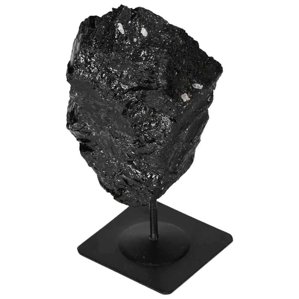 Premium Rough Tourmaline With Metal Stand by Sylvia Crystals, featuring a raw black tourmaline stone on a square base.