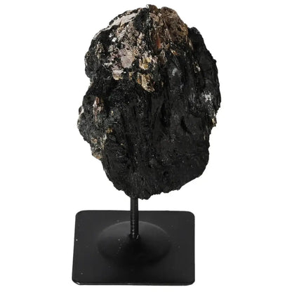Rough tourmaline on sophisticated metal stand showcasing natural elegance and mystique, ideal centerpiece from Sylvia Crystals.
