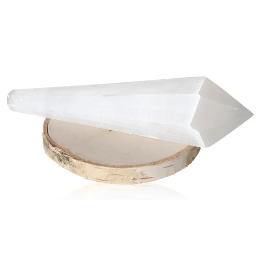 Selenite 15cm point with glass-like transparency, showcasing its natural striations and silky finish, ideal for peaceful energy.