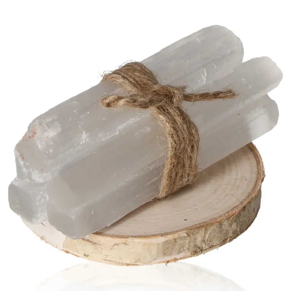 Selenite Rough Pak 10cm with silky striations showcases its glass-like transparency, ideal for creating a calm, harmonious atmosphere.