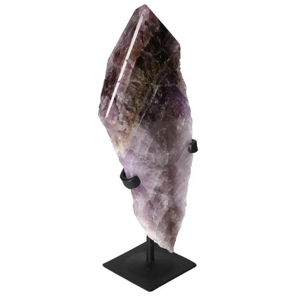 Seven Point Polished Amethyst crystal on a stand from Sylvia Crystals, showcasing its deep purple hues and natural beauty.
