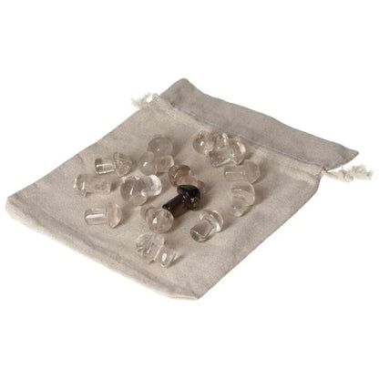 Collection of small Smoky Quartz mushroom stones on a fabric pouch, ideal for decision-making support and stress relief.
