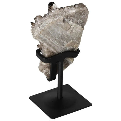 Smoky Quartz crystal on a metal stand from Sylvia Crystals, promoting elegance and grounding energies in home decor.