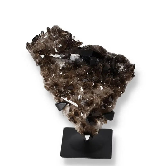 Smoky Quartz on metal stand from Sylvia Crystals, ideal for professionals seeking clarity and balance in decision-making.