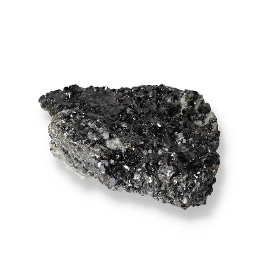 Sphalerite mineral specimen with shimmering dark crystal surface, used in jewelry and spiritual practices for energy grounding.