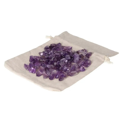 Tumbled Amethyst stones in a cloth bag enhance concentration, reduce stress, and provide energy boost for emotional stability.