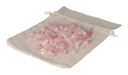 Tumbled Rose Quartz stones in a cloth bag, symbolizing love and healing, promoting empathy and emotional well-being.