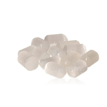 Tumbled Selenite stones for mindfulness and spiritual growth by Sylvia Crystals, ethically sourced for purity and power.