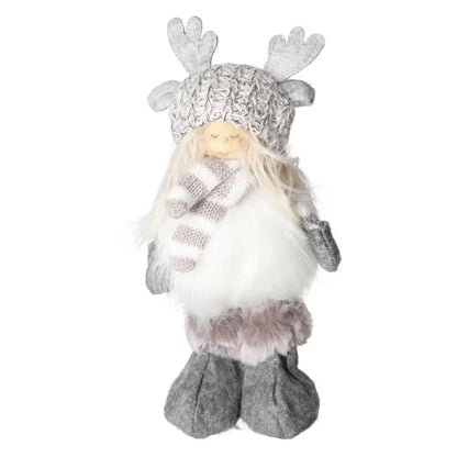 Gray textile winter child figurine with knitted hat and scarf, featuring soft faux fur accents, styled as a whimsical holiday decor item.