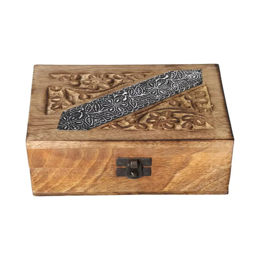 Ornate wooden jewelry box with intricate carvings, representing luxury and spiritual connection, by Sylvia Crystals.