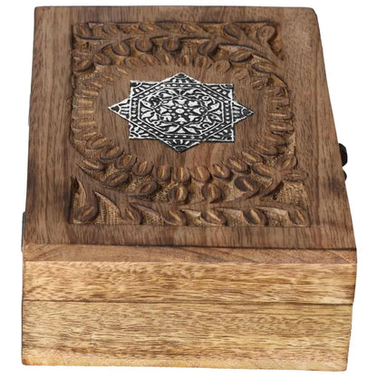 Exquisite wooden jewelry box with ornate carved design, crafted by Sylvia Crystals, showcasing luxury and elegance for treasured items.