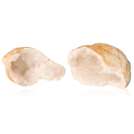 Milky quartz geodes with earthy shells and sparkling white crystals for boosting focus and positive energy.