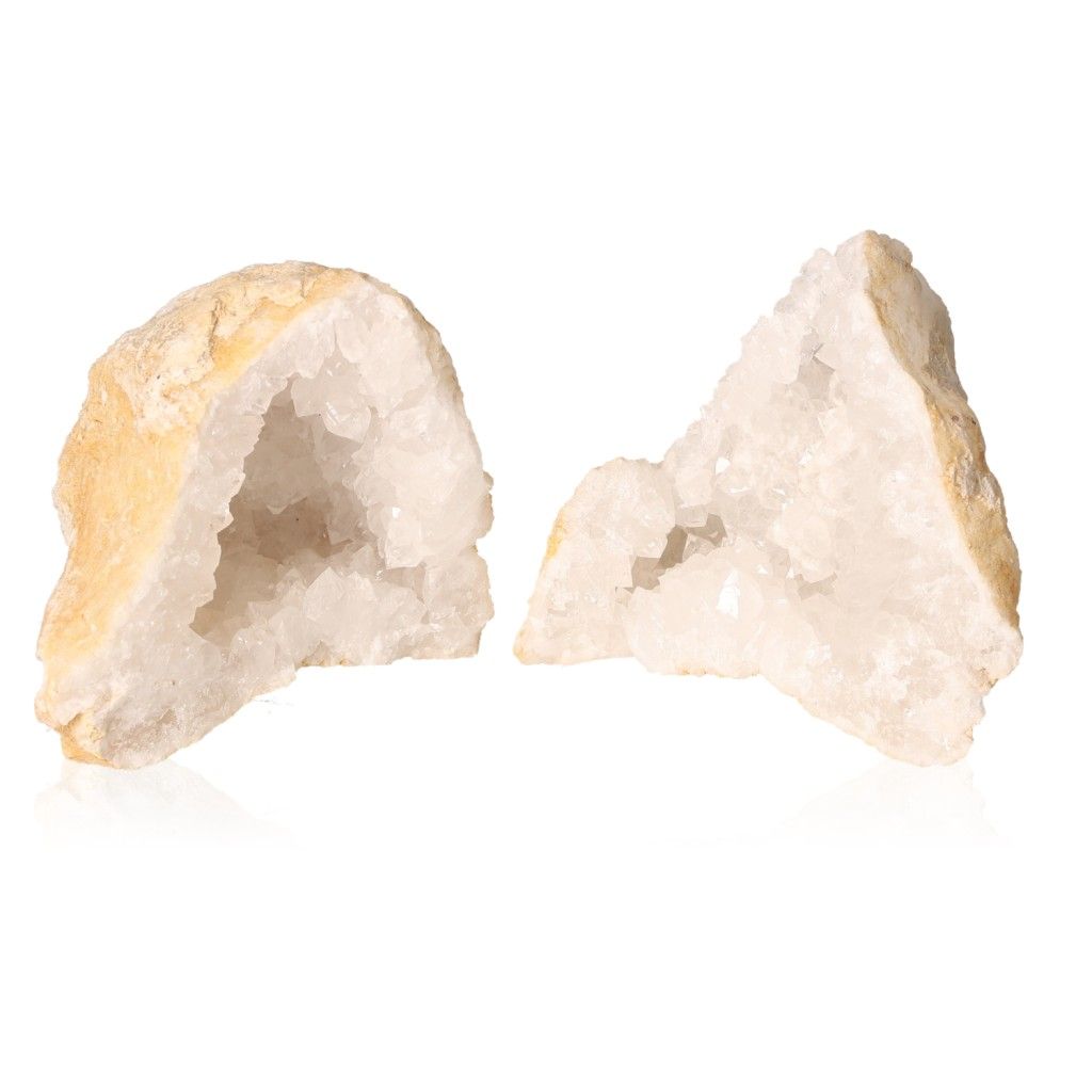 Milky quartz geodes with sparkling crystals, known for purifying energy, enhancing tranquility, and promoting focus and positive vibes.