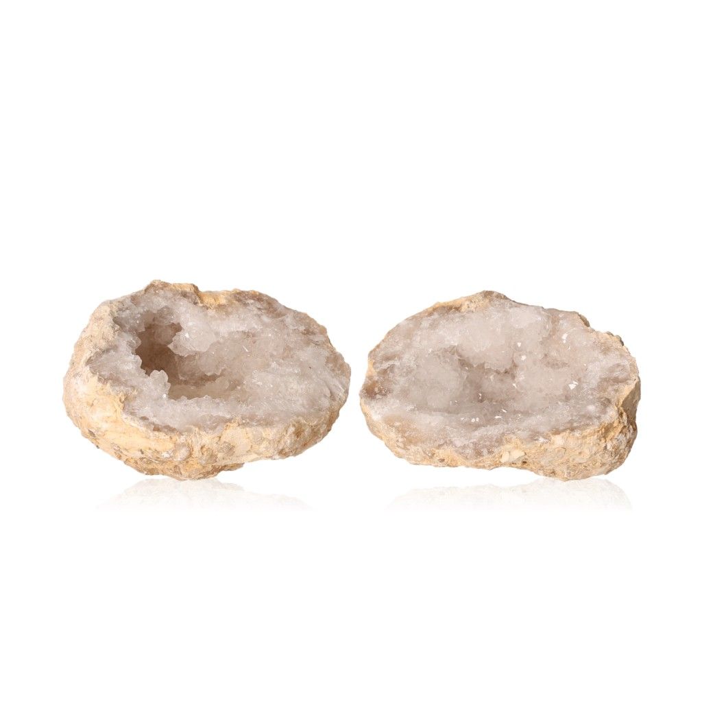 Milky quartz geodes with rugged exterior and sparkling white crystals for purification and positive energy.