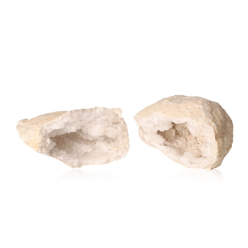 Milky quartz geode with rugged outer shell revealing sparkling white crystals, ideal for energy cleansing and focus enhancement.