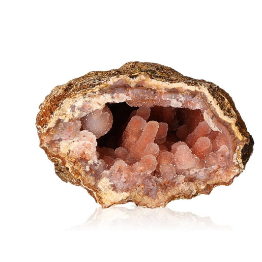 Calcite stalactite with layered structures and earthy tones showcasing natural beauty and metaphysical properties for growth and energy.