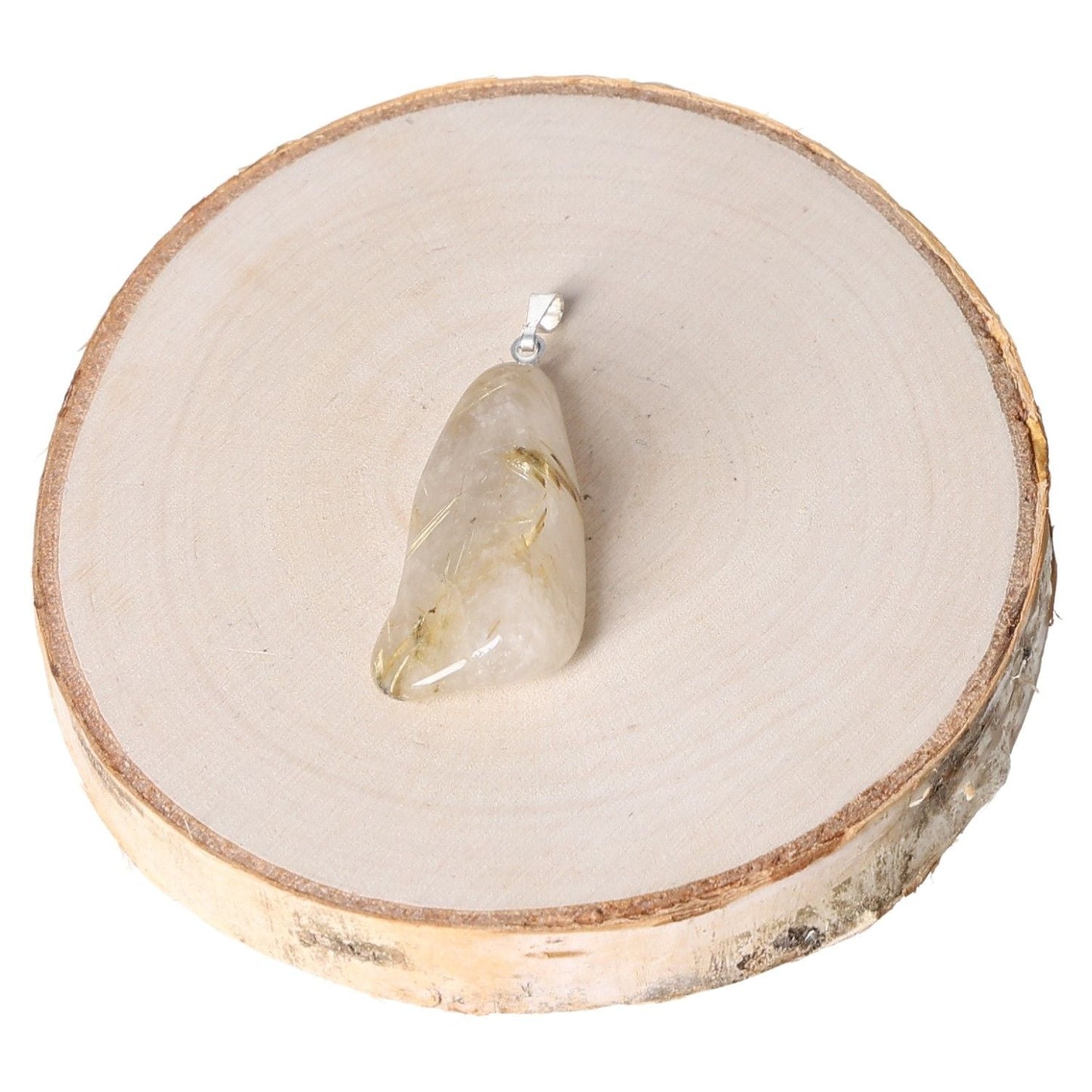 Rock Crystal with Rutile AA tumbled pendant on a wooden display