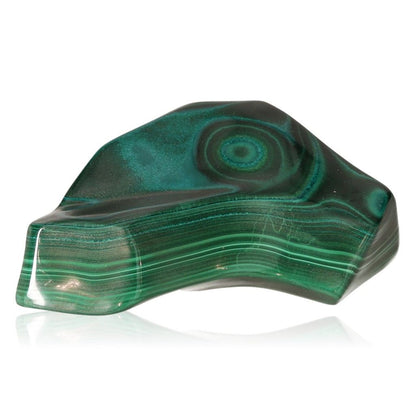 Polished malachite stone with green concentric patterns, representing nature's soothing energy and promoting courage and positivity.