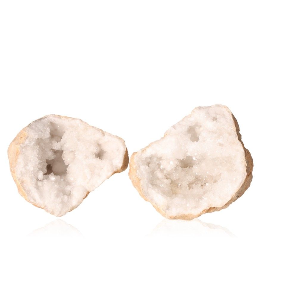 Milky quartz geode with a rugged shell open to reveal sparkling white crystals, perfect for enhancing tranquility and clarity.