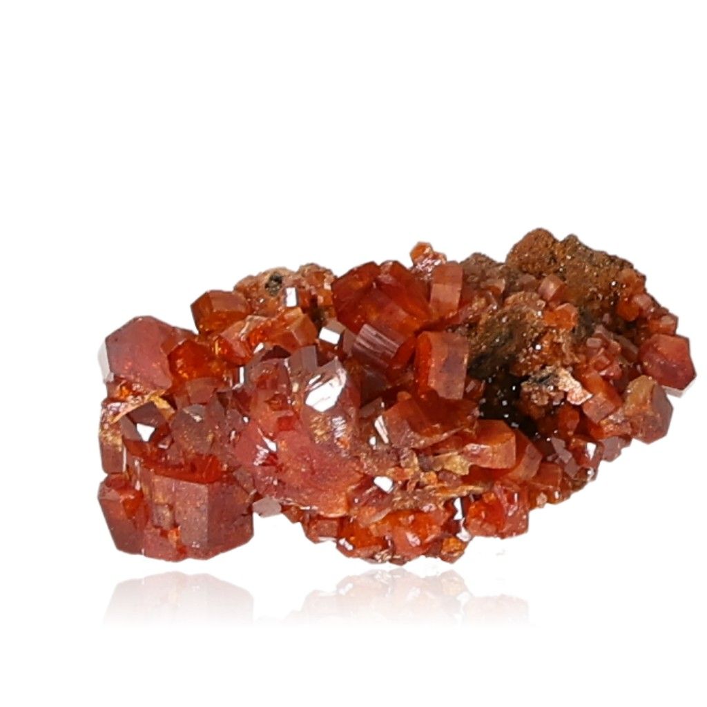 Vanadinite Druze with vibrant reddish-brown hexagonal crystals on a glassy surface, enhancing focus and motivation.