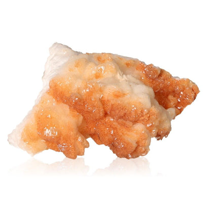 Cave calcite stalactite cluster showcasing intricate orange and white mineral formations.