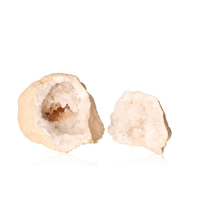 Milky quartz geode with rugged shell revealing sparkling cloudy white crystals, ideal for energy cleansing and enhancing tranquility.