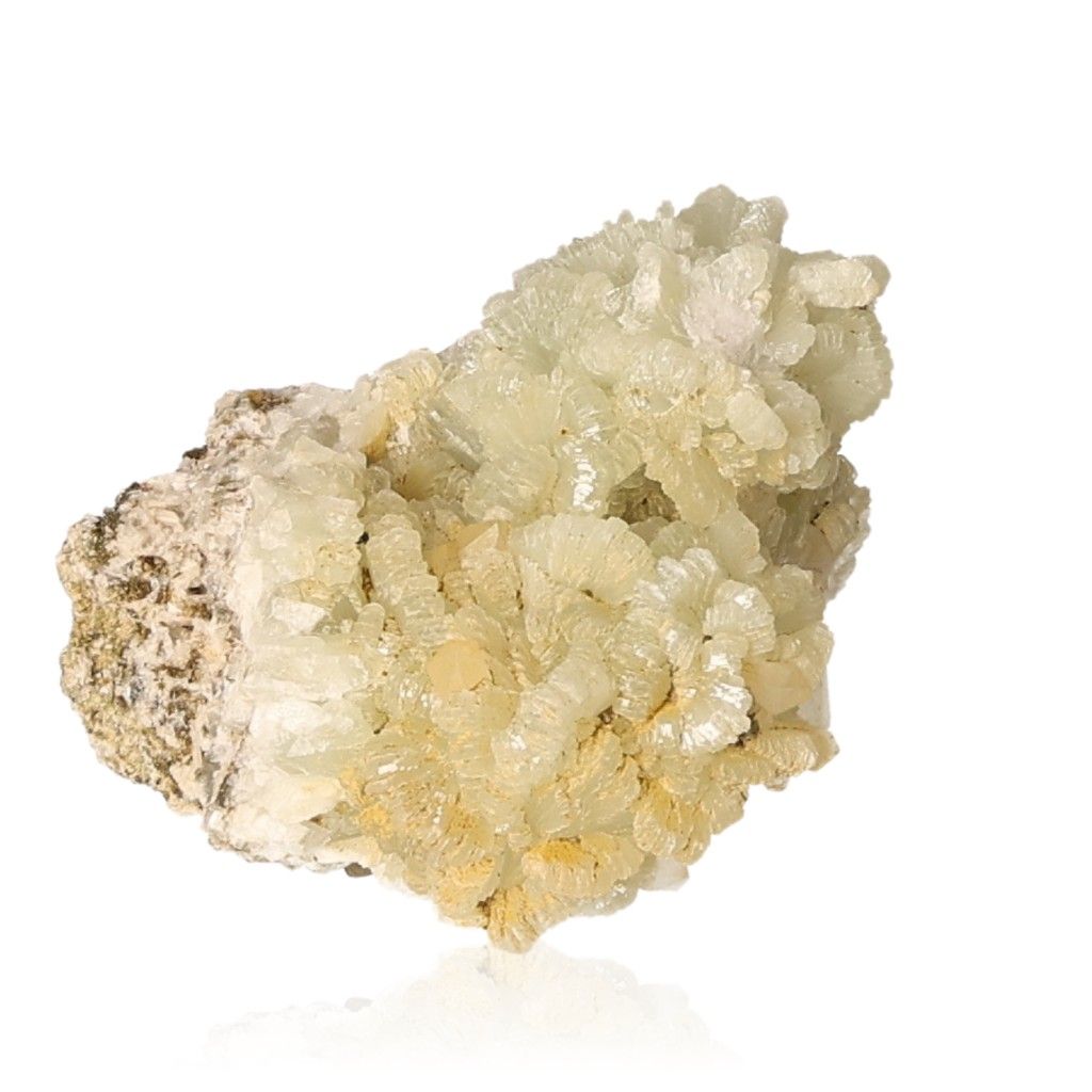 Stunning Prehnite druzy with pale green crystals and calming properties for spiritual growth and inner harmony.