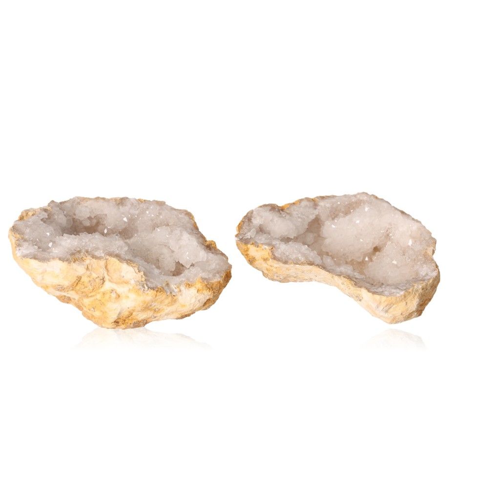 Milky quartz geode with rugged shell and sparkling white crystals, enhances energy balance and promotes focus.