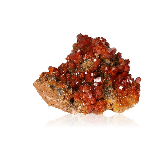 Vanadinite Druze with vibrant reddish-brown hexagonal crystals, enhancing focus and motivation with its bold colors and geometric shapes.