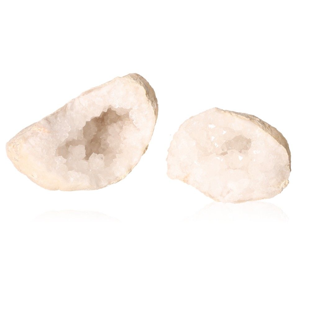 Milky quartz geode halves with sparkling white crystals showcasing a rugged outer shell, ideal for cleansing and balancing energy.