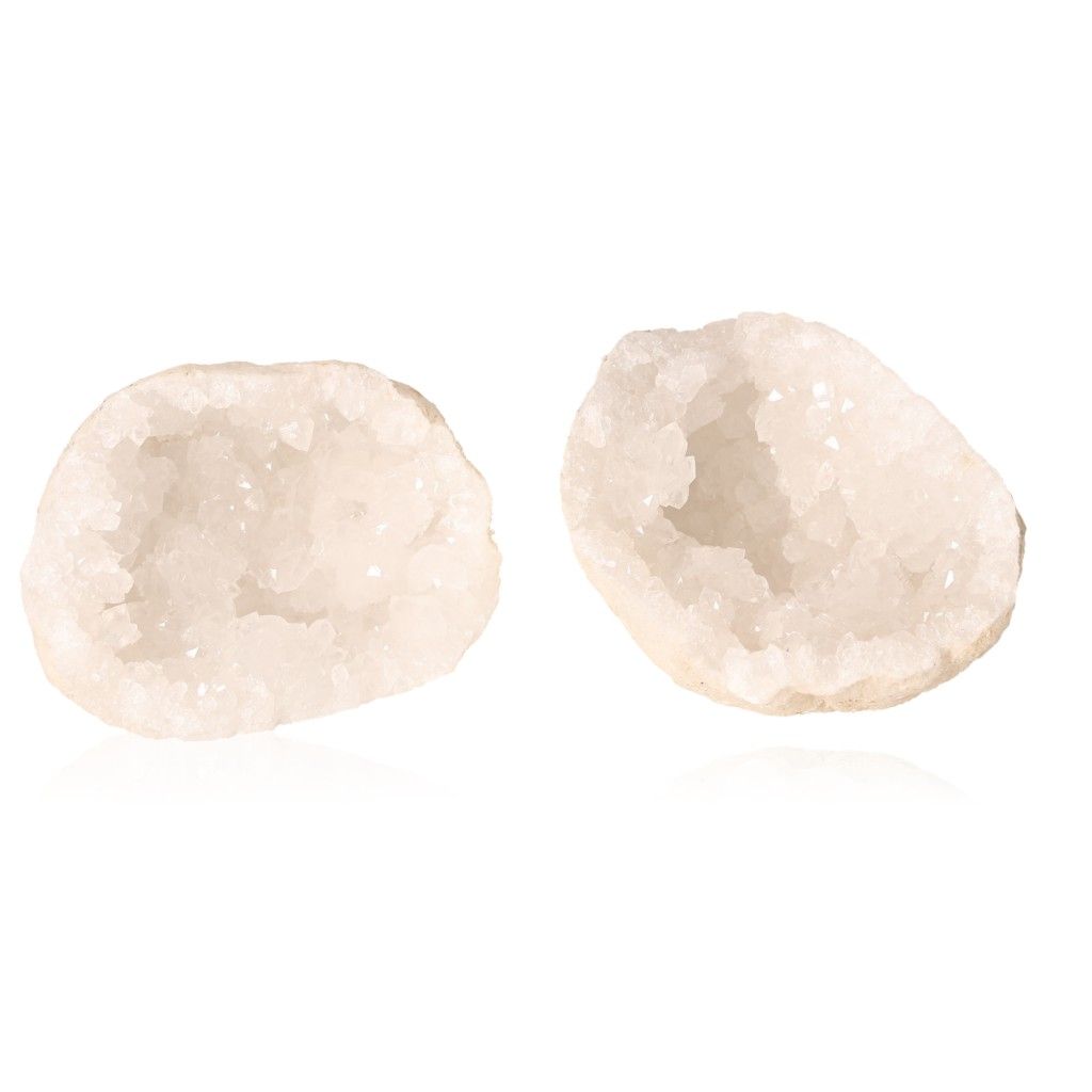 Milky quartz geodes with sparkling white crystals and rugged shell for energy balance and clarity.